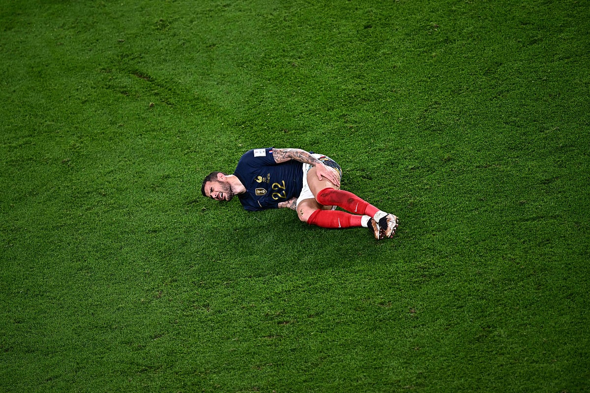 France's defender #22 Theo Hernandez gestures in pain during the Qatar 2022 World Cup Group D football match between France and Australia at the Al-Janoub Stadium in Al-Wakrah, south of Doha on 22 November, 2022