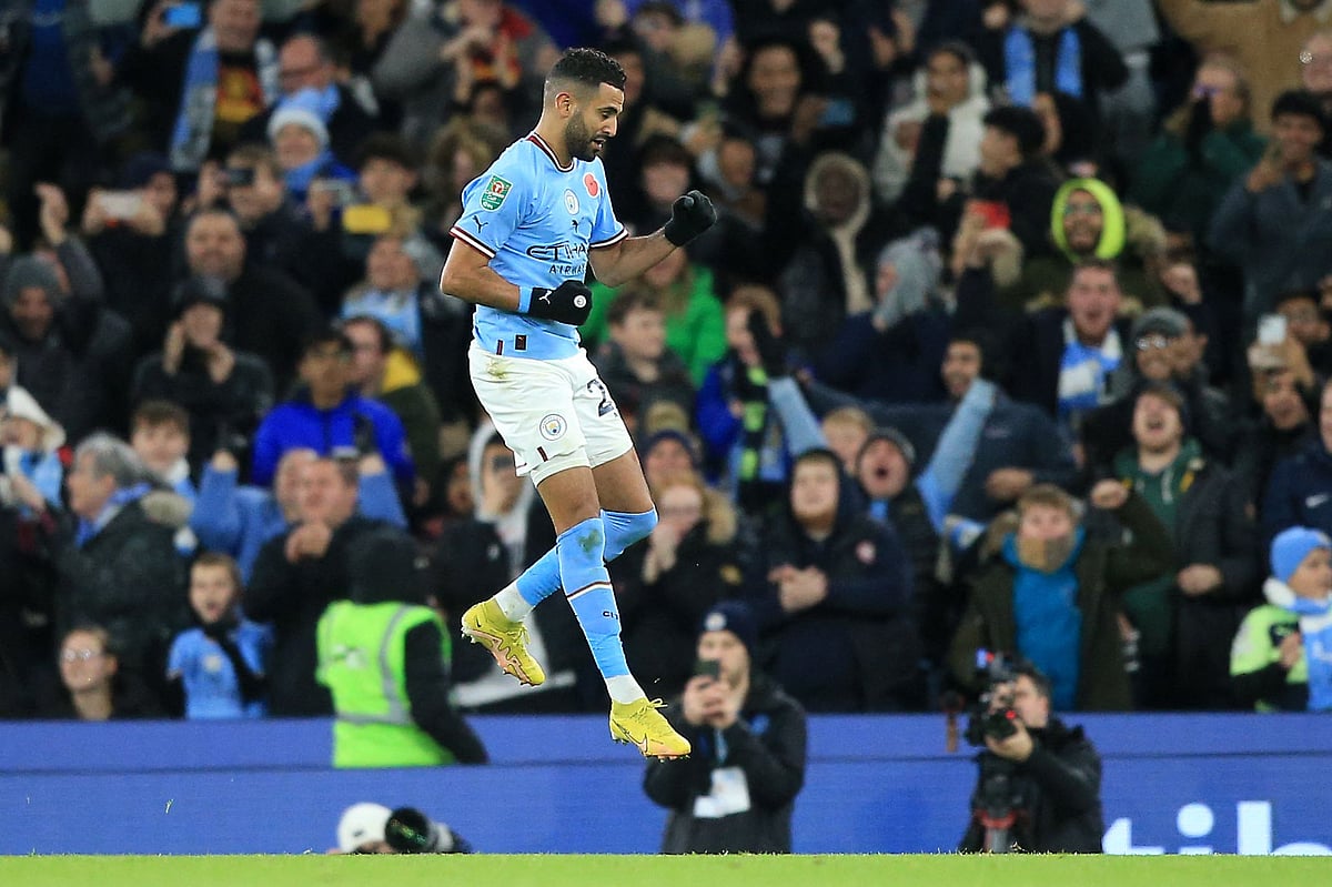 Manchester City's Algerian midfielder Riyad Mahrez celebrates scoring his team's first goal during the English League Cup third round football match between Manchester City and Chelsea at the Etihad stadium in Manchester, northwest England on 9 November, 2022