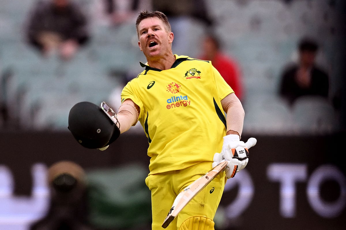 Australia's David Warner celebrates scoring a century against England during the third ODI between Australia and England at the MCG in Melbourne on 22 November, 2022