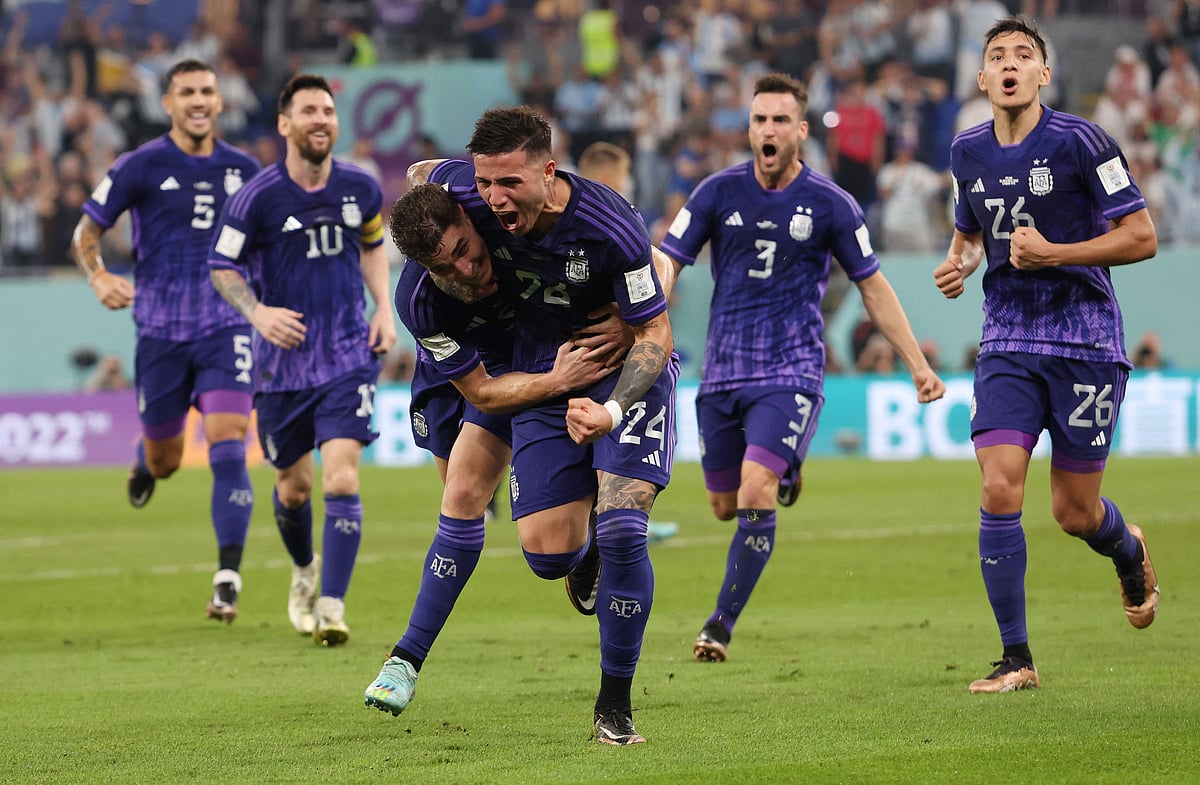 Argentina's Julian Alvarez celebrates scoring their second goal with Enzo Fernandez and teammates at the FIFA World Cup 2022 Group C match of Poland v Argentina at the Stadium 974 in Doha, Qatar on 30 November, 2022