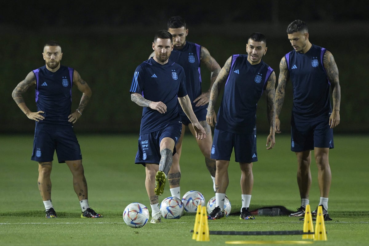 Argentina's forward #10 Lionel Messi (2nd L) takes part in a training session at the Qatar University training site in Doha on 25 November, 2022, on the eve of the Qatar 2022 World Cup football match between Argentina and Mexico.