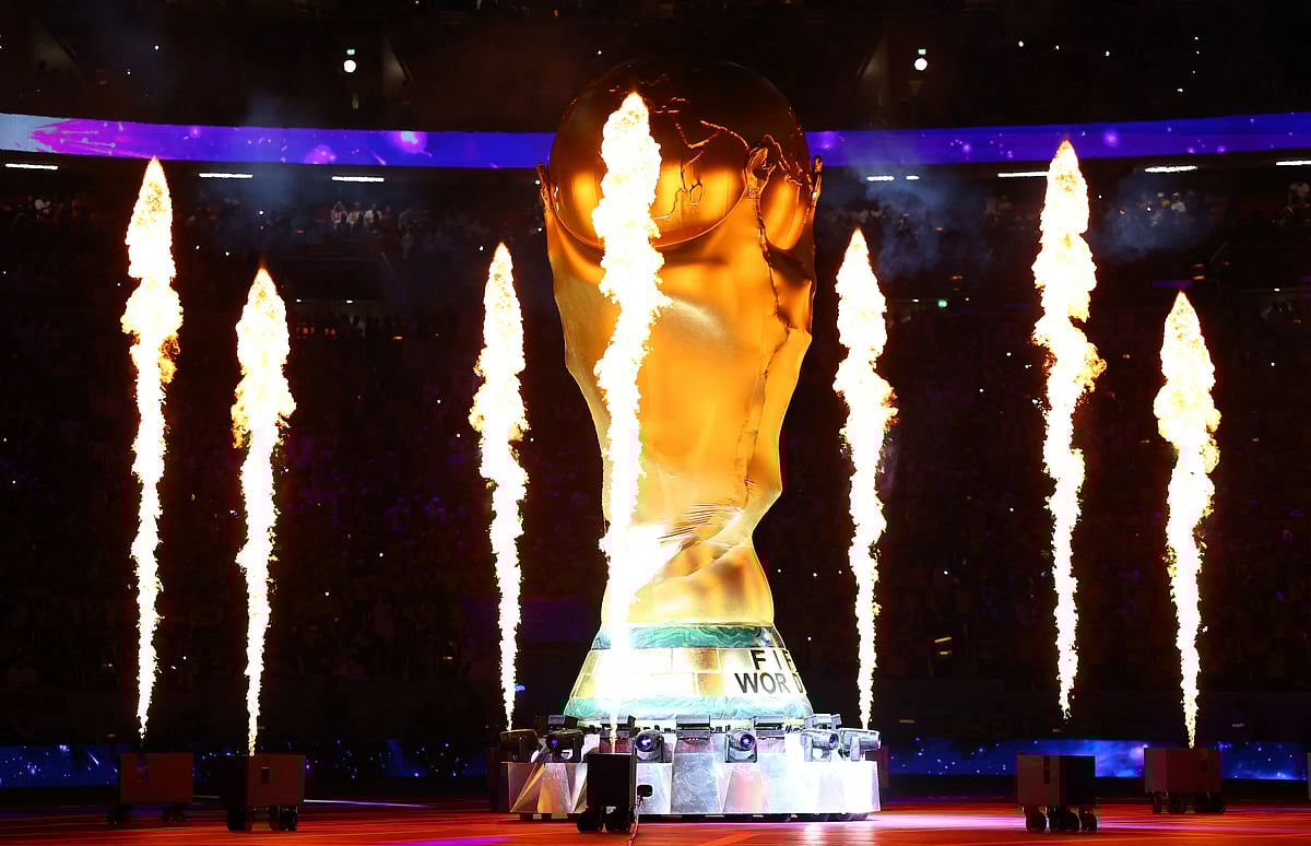 A FIFA World Cup trophy replica is seen on the pitch during the opening ceremony of the Qatar World Cup at the Al Bayt Stadium in Al Khor, Qatar on 20 November, 2022