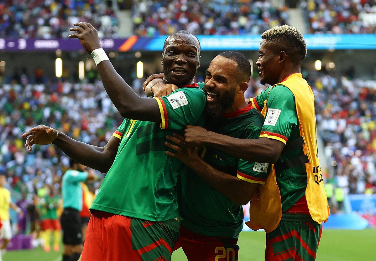Cameroon's Vincent Aboubakar and teammate celebrates their third goal, scored by Eric Maxim Choupo-Moting, in the FIFA World Cup 2022 Group G match of Cameroon v Serbia at the Al Janoub Stadium in Al Wakrah, Qatar on 28 November, 2022