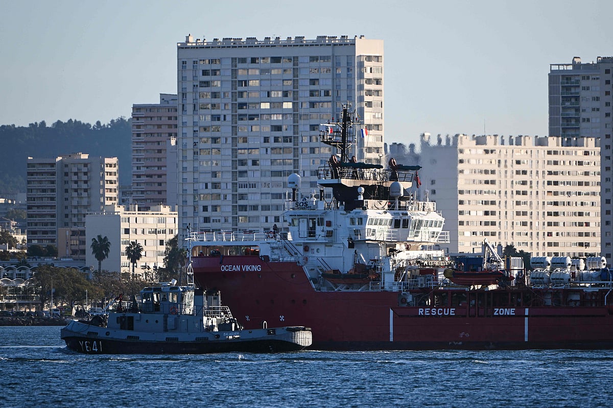 The Ocean viking " rescue ship of European maritime-humanitarian organisation "SOS Mediterranee" escorted by a military boat arrives at Toulon with migrants on board, on November 11, 2022