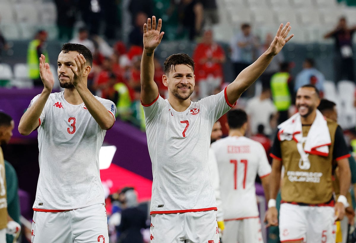 Tunisia's Youssef Msakni and Montassar Talbi react after the FIFA World Cup 2022 Group D match Denmark v Tunisia at the Education City Stadium, Al Rayyan, Qatar on 22 November, 2022