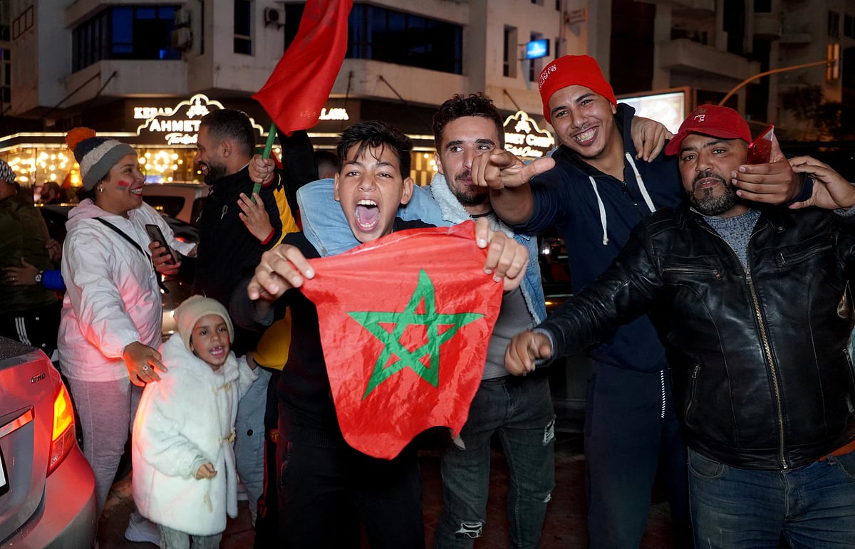 Morocco fans celebrate in Casablanca, Morocco on 6 December, 2022 after Morocco qualified for the quarter-finals of the Qatar World Cup