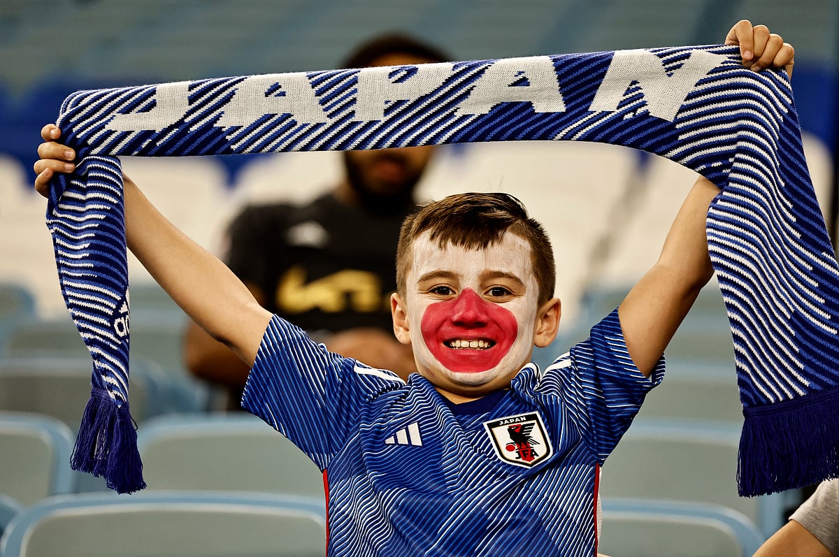 A Japan fan holds up a scarf inside the stadium before the FIFA World Cup 2022 Round of 16 match of Japan v Croatia at the Al Janoub Stadium in Al Wakrah, Qatar on 5 December, 2022