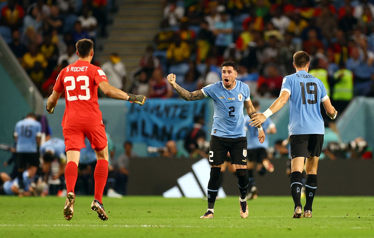 Uruguay's Jose Maria Gimenez celebrates after Giorgian de Arrascaeta scores their second goal against Ghana