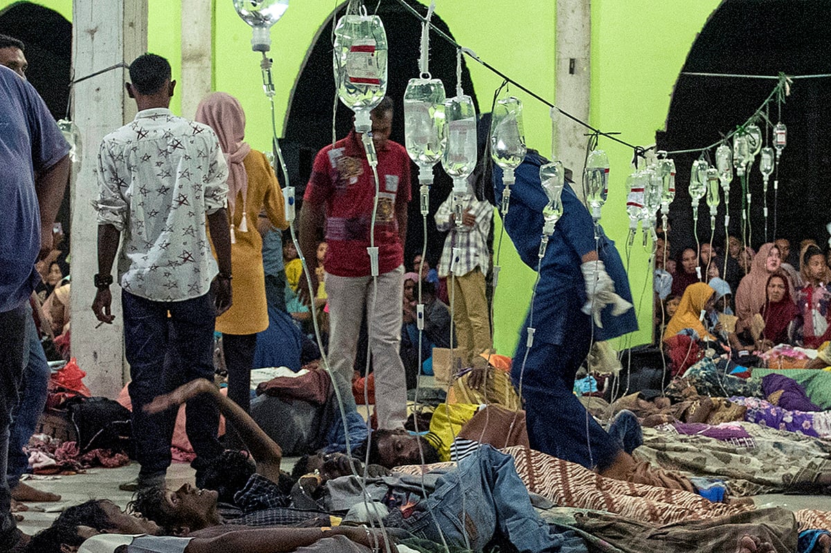 Rohingya refugees receive medical treatment at a temporary shelter in Pidie, Aceh province, Indonesia, on 26 December, 2022, in this photo taken by Antara Foto.