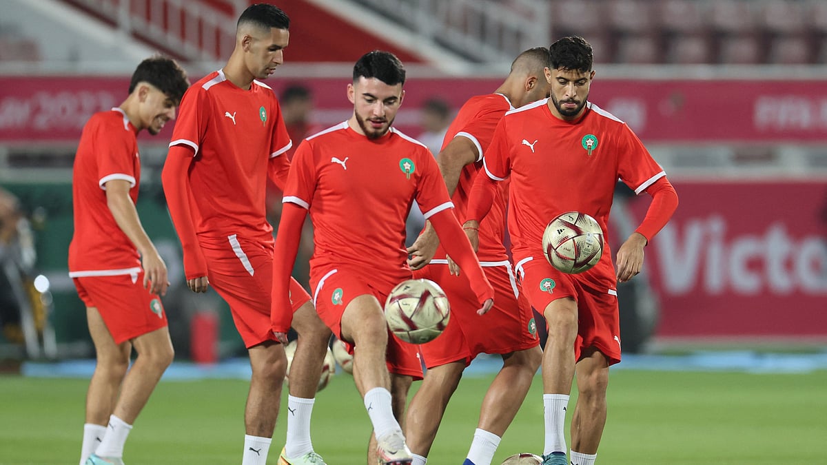 Morocco's players take part in a training session at the Al Duhail SC Stadium in Doha on 13 December 2022, on the eve of the Qatar 2022 World Cup football semi-final match between France and Morocco.