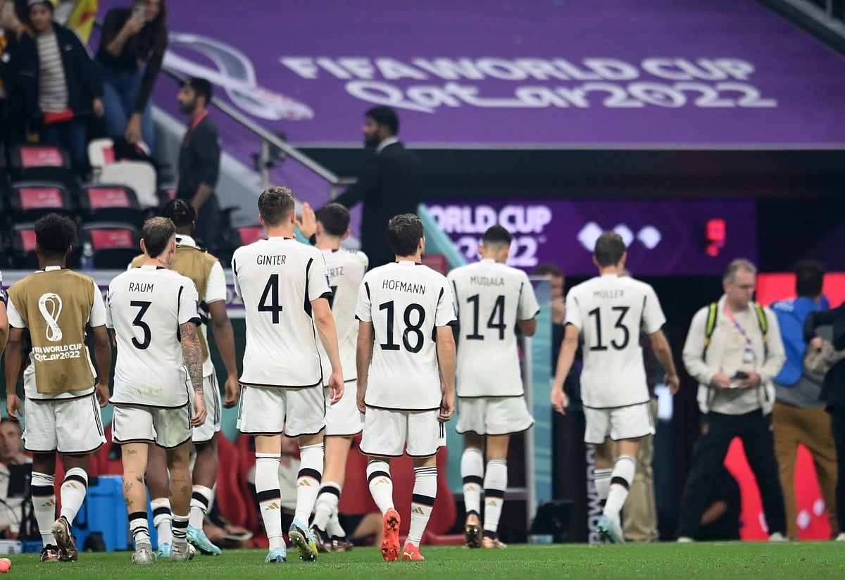 Germany players look dejected after the match as Germany are eliminated from the World Cup