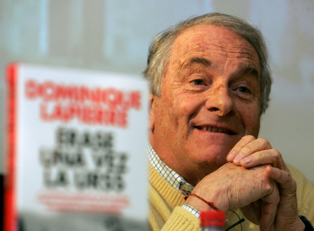 In this file photo taken on 18 January, 2006 French author Dominique Lapierre speaks at a press conference to promote the Spanish translation of his book 'Once upon a time in the USSR' in Madrid.