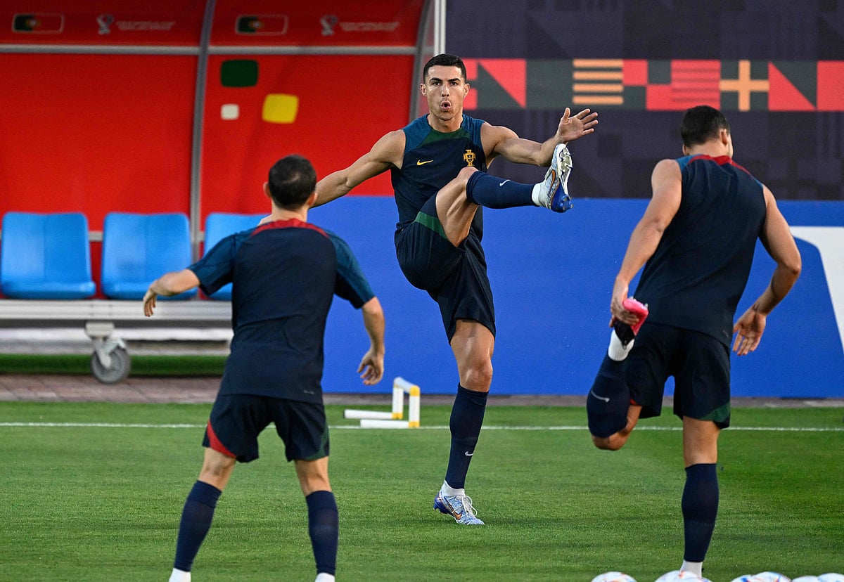 Portugal's forward #07 Cristiano Ronaldo (C) and his teammates take part in a training session at the Al Shahaniya SC training site, northwest of Doha on 9 December, 2022, on the eve of the Qatar 2022 World Cup quarter-final football match between Morocco and Portugal