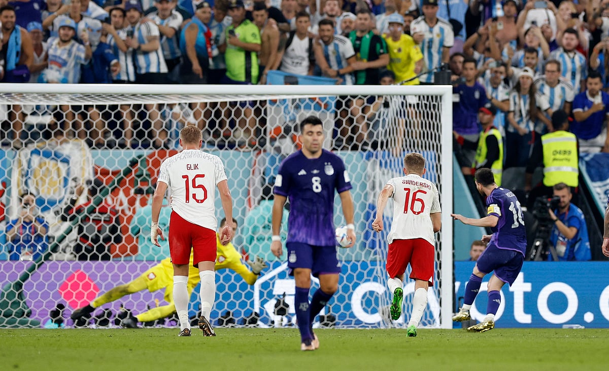 Argentina's Lionel Messi misses from the penalty against Poland