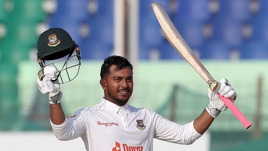 Zakir Hasan celebrates after scoring a century on Test debut on Day 4 of the first Test against India at the Zahur Ahmed Chowdhury Stadium in Chattogram on 17 December, 2022