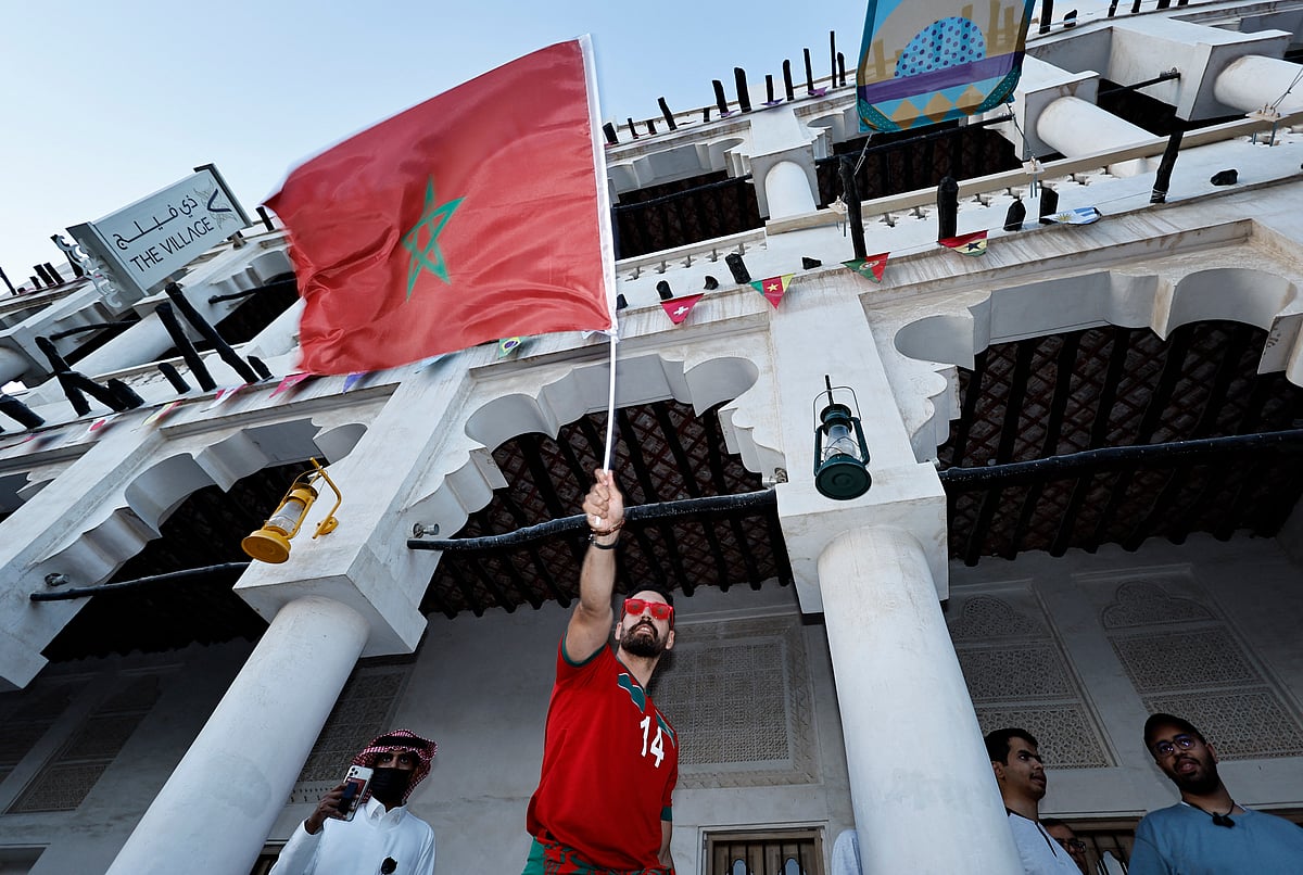 Morocco fan with a Morocco flag in Souq Waqif ahead of the Morocco v France semi final match of the FIFA World CUp 2022 in Doha, Qatar on 14 December, 2022