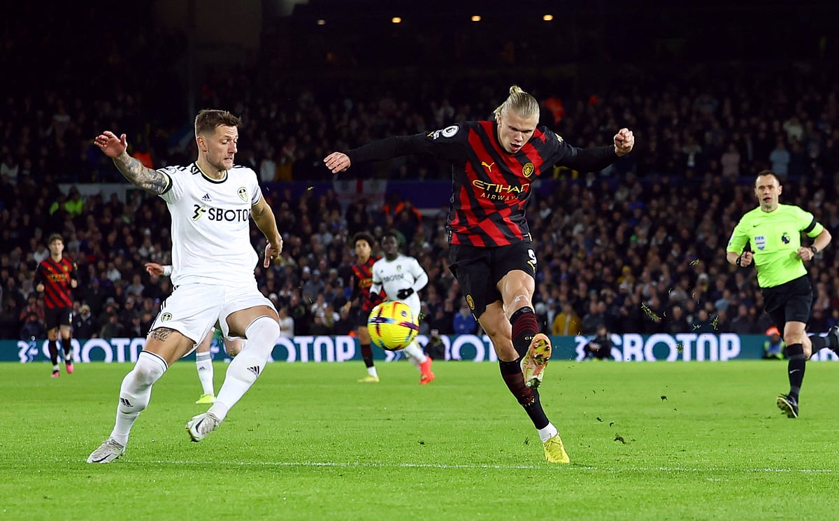 Manchester City's Erling Braut Haaland shoots at goal during the English Premier League football match against Leeds United on 28 December 2022