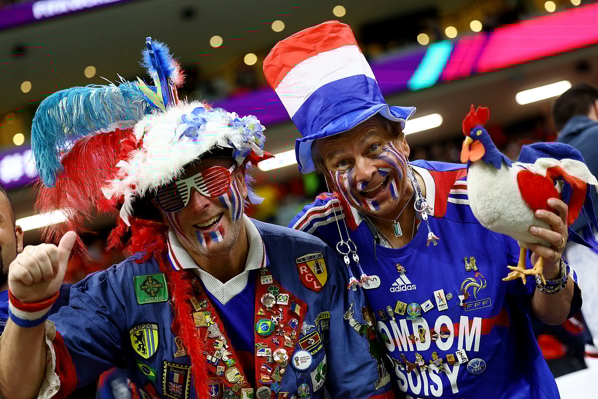 France fans wearing face paint inside the stadium before the FIFA World Cup 2022 semifinal match between France and Morocco at the Al Bayt Stadium in Al Khor, Qatar on 14 December, 2022