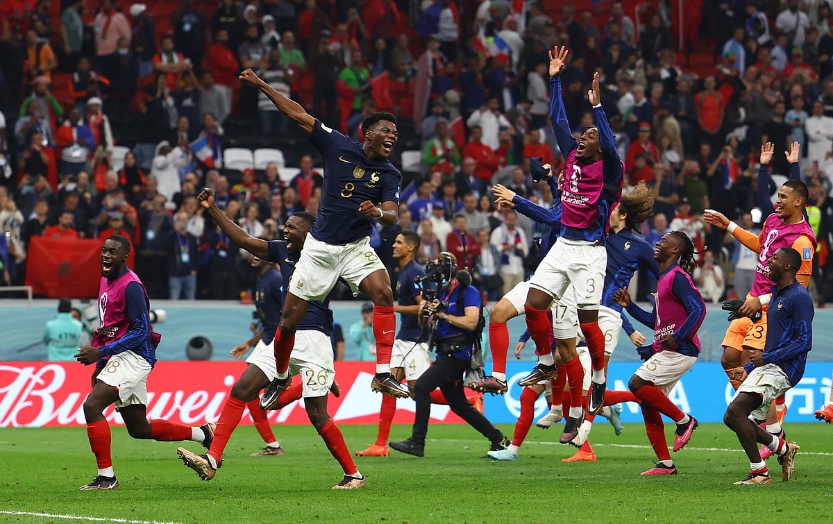 France's Aurelien Tchouameni, Axel Disasi and teammates celebrate after the match as France reach the final