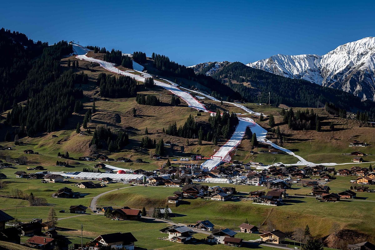 This photograph taken on 6 January, 2023 shows the "Chuenisbargli" slope amid snowless landscape on the eve of the FIS Alpine ski World Cup events in the Swiss alpine resort of Adelboden. Due to the lack of snow, several mid-altitude ski resorts had to close in Switzerland.