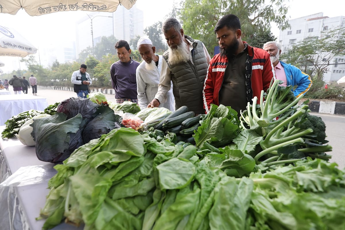 Customers at a vegetable stall