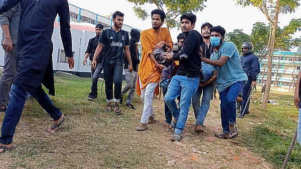 An injured BCL activist is being taken to hospital at Sylhet Agricultural University on 6 January, 2023.