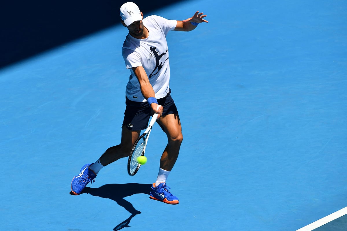 Serbia's Novak Djokovic hits a return during a practice session ahead of the Australian Open tennis tournament in Melbourne on 14 January, 2023