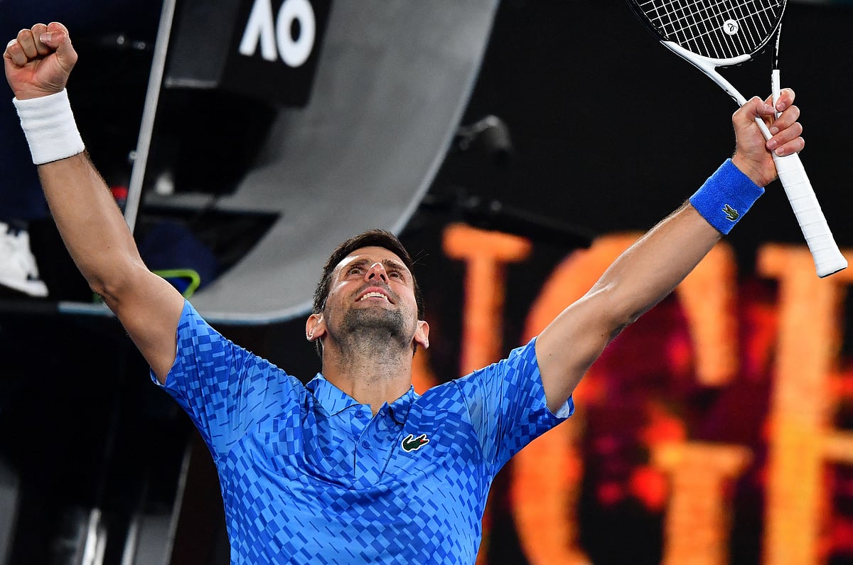 Serbia's Novak Djokovic celebrates after winning against Spain's Roberto Carballes Baena during their men's singles match on day two of the Australian Open tennis tournament in Melbourne early on 18 January, 2023
