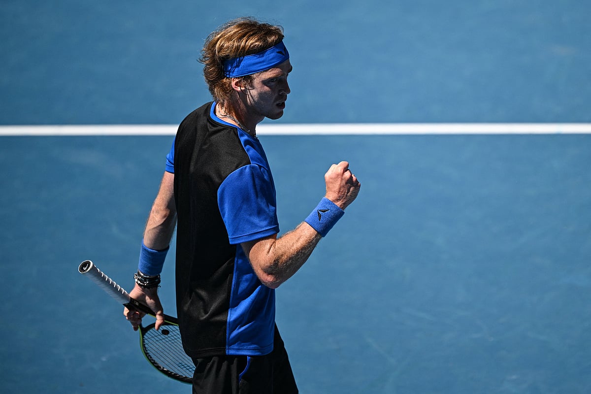 Russia's Andrey Rublev reacts after a point against Austria's Dominic Thiem during their men's singles match on day two of the Australian Open tennis tournament in Melbourne on 17 January, 2023