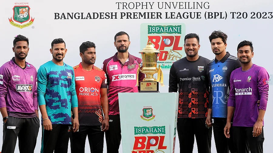 Captains of BPL 2023 teams pose with the trophy at the trophy unveiling ceremony held at the Sher-e-Bangla National Cricket Stadium in Dhaka on 5 January, 2023