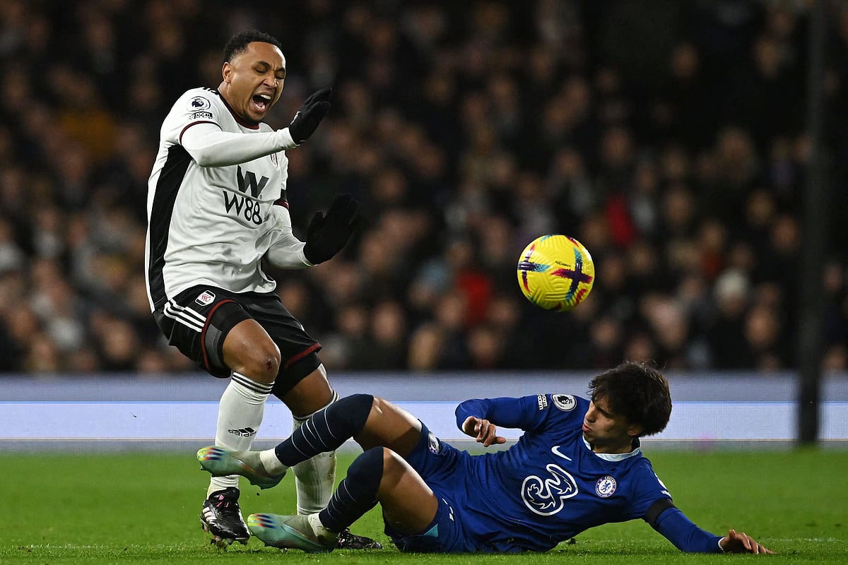 Chelsea's Portuguese striker Joao Felix was sent off for this tackle on Fulham's Dutch defender Kenny Tete during their English Premier League match at Craven Cottage in London on 12 January, 2023