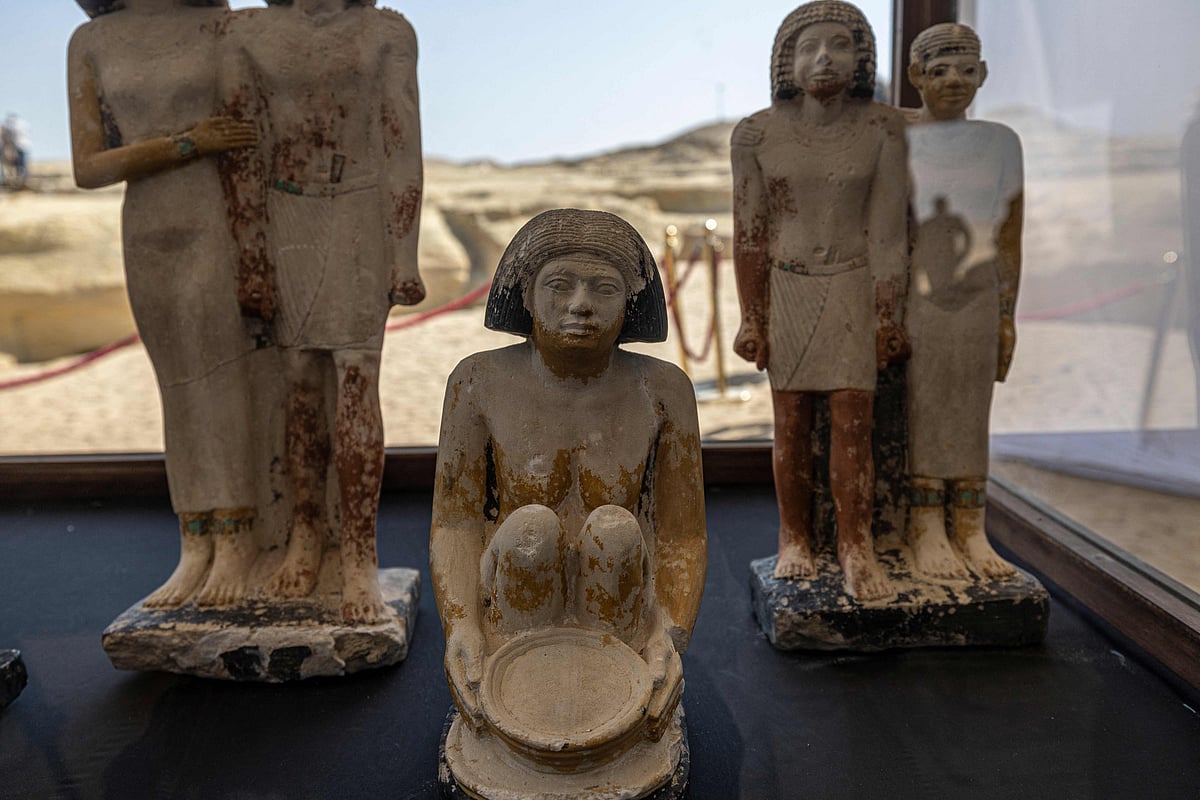 Artifacts are displayed at the Saqqara archaeological site, where a gold-laced mummy and four tombs including of an ancient king's "secret keeper" were recently discovered, south of Cairo on January 26, 2023.