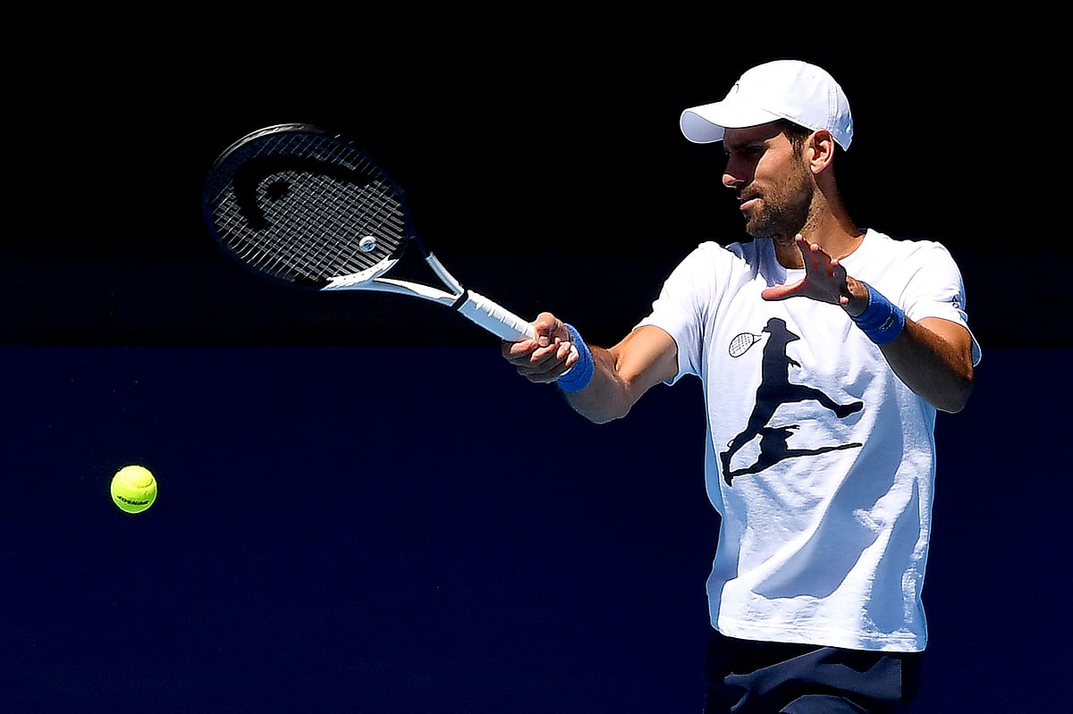 Serbia's Novak Djokovic hits a return during a practice session ahead of the Australian Open in Melbourne on 14 January, 2023