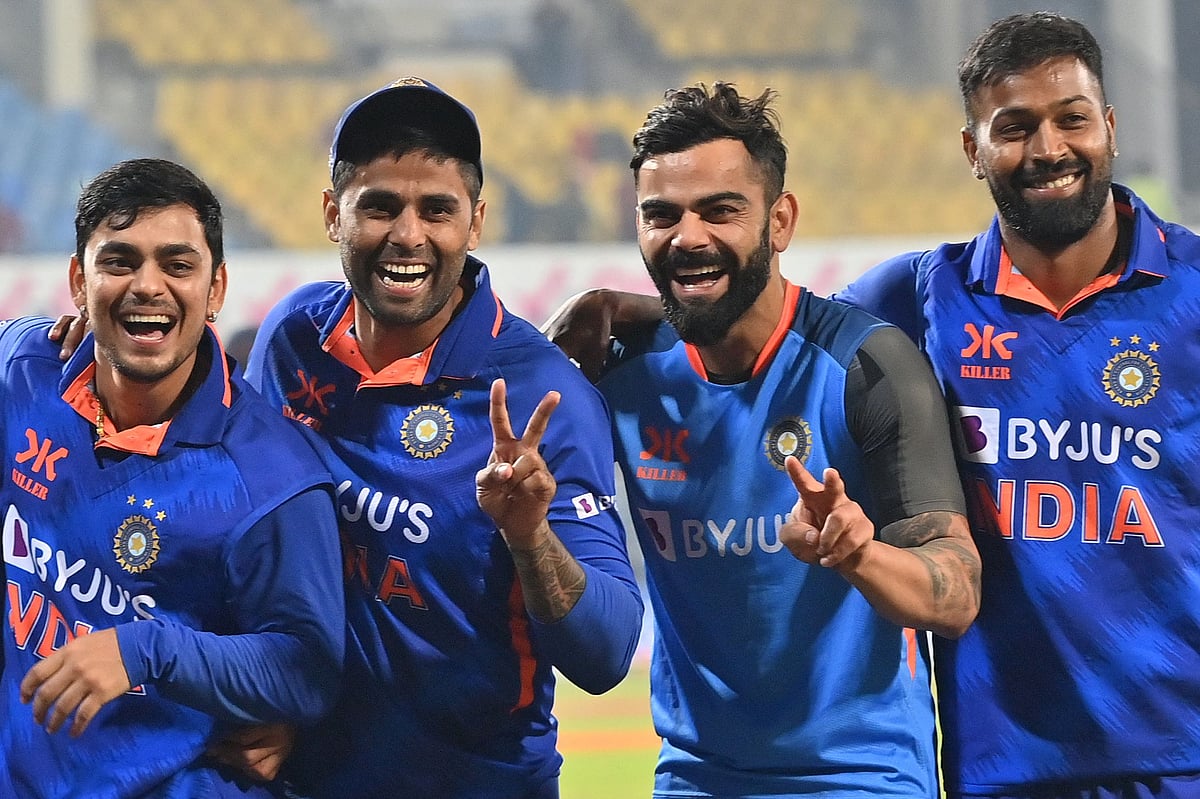 India's Ishan Kishan, Suryakumar Yadav, Virat Kohli and Hardik Pandya pose after winning the third and final ODI between India and New Zealand at the Holkar Cricket Stadium in Indore on 24 January, 2023