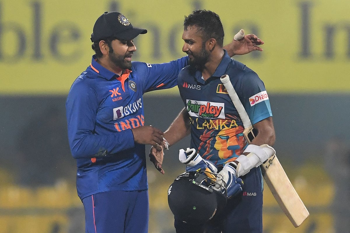 India's captain Rohit Sharma congratulates Sri Lanka's captain Dasun Shanaka for his century at the end of the first ODI between India and Sri Lanka at the Assam Cricket Association Stadium in Guwahati on 10 January, 2023