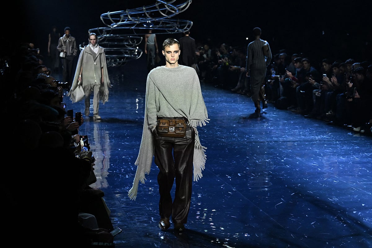 Models present creations by Fendi during the Autumn-Winter 2023-2024 Men's fashion show, as part of the Milan Fashion Week, in Milan on 14 January, 2023.