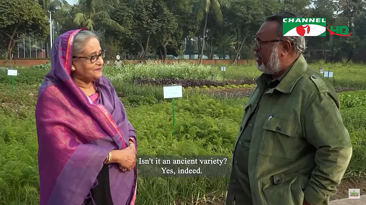 Prime minister Sheikh Hasina talks to Shykh Seraj about her farmland in the large courtyard of Ganabhaban, the official residence of the Bangladesh Prime Minister