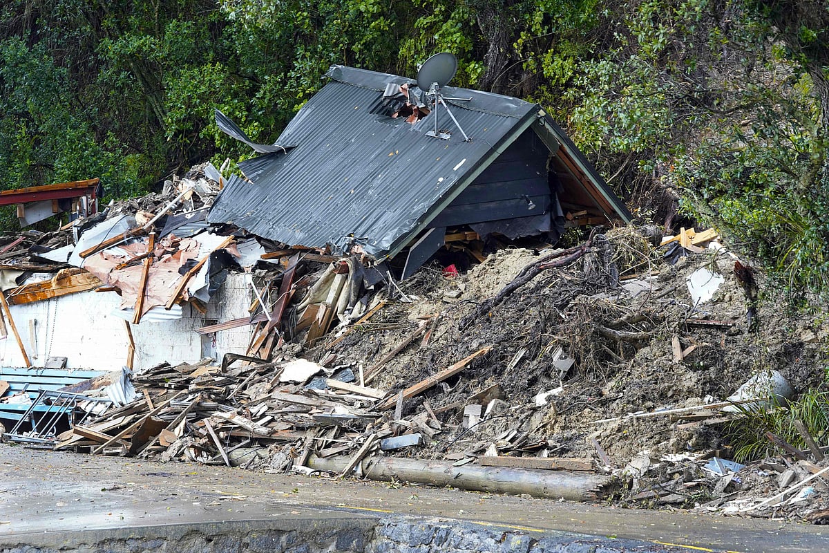 A general view of a damaged house after a storm battered Titirangi, a suburb of New Zealand's West Auckland area, on 13 February, 2023