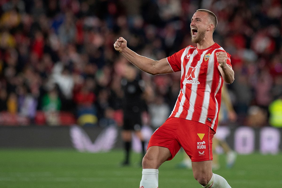 Almeria's Brazilian defender Rodrigo Ely celebrates at the end of the Spanish League football match between UD Almeria and FC Barcelona at the Municipal Stadium of the Mediterranean Games in Almeria, on 26 February, 2023