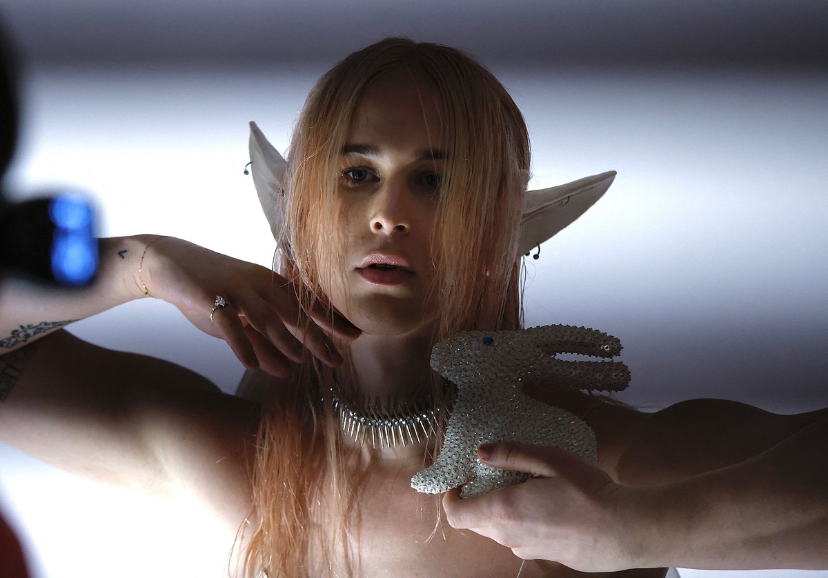 A model gets ready for the Collina Strada show during New York Fasion Week (NYFW) in New York on 10 February, 2023. New York Fashion Week kicks off February 10, 2023, with several big names absent from the runway but a calendar packed full of young designers and emerging labels -- increasingly the event's trademark. Rodarte opens the Fall-Winter 2023 parade, with Thom Browne, the new head of the Council of Fashion Designers of America (CFDA) that runs the event, showcasing on Tuesday.