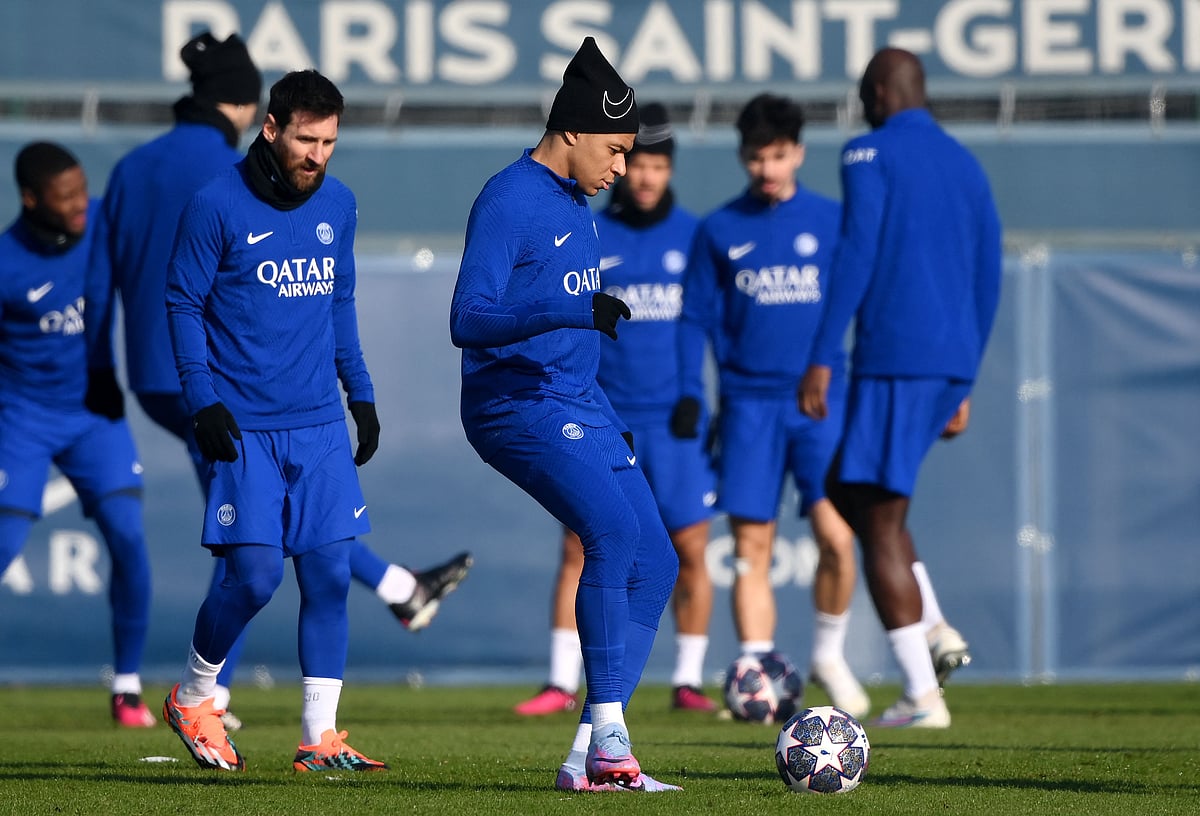 Paris Saint-Germain's French forward Kylian Mbappe and Paris Saint-Germain's Argentine forward Lionel Messi take part in a training session in Saint-Germain-en-Laye, west of Paris on 13 February, 2023, on the eve of the UEFA Champions League round of Last 16 First leg football match against FC Bayern Munich