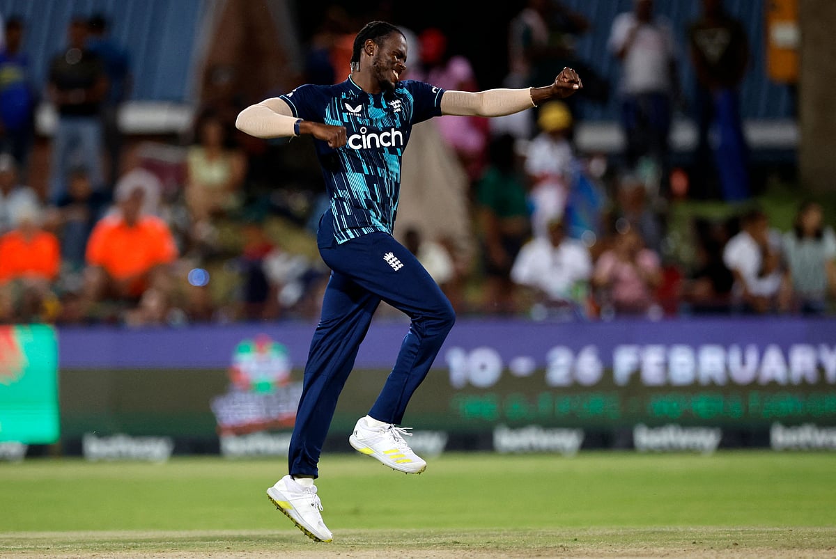 England's Jofra Archer celebrates after the dismissal of South Africa's Tabraiz Shamsi during the third one day international (ODI) cricket match between South Africa and England at Mangaung Oval in Kimberley on 1 February, 2023