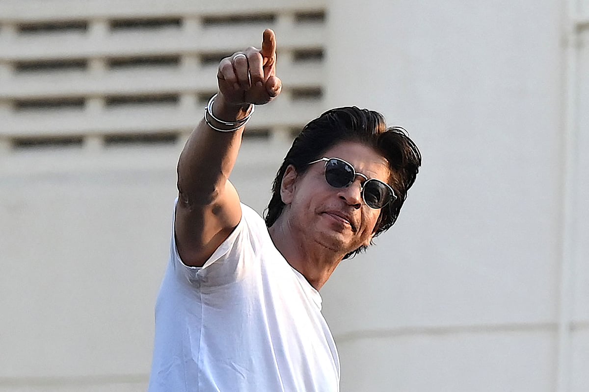 In this file photo taken on 2 November, 2022 Bollywood actor Shah Rukh Khan greets fans during his birthday celebrations at his Mannat residence in Mumbai.