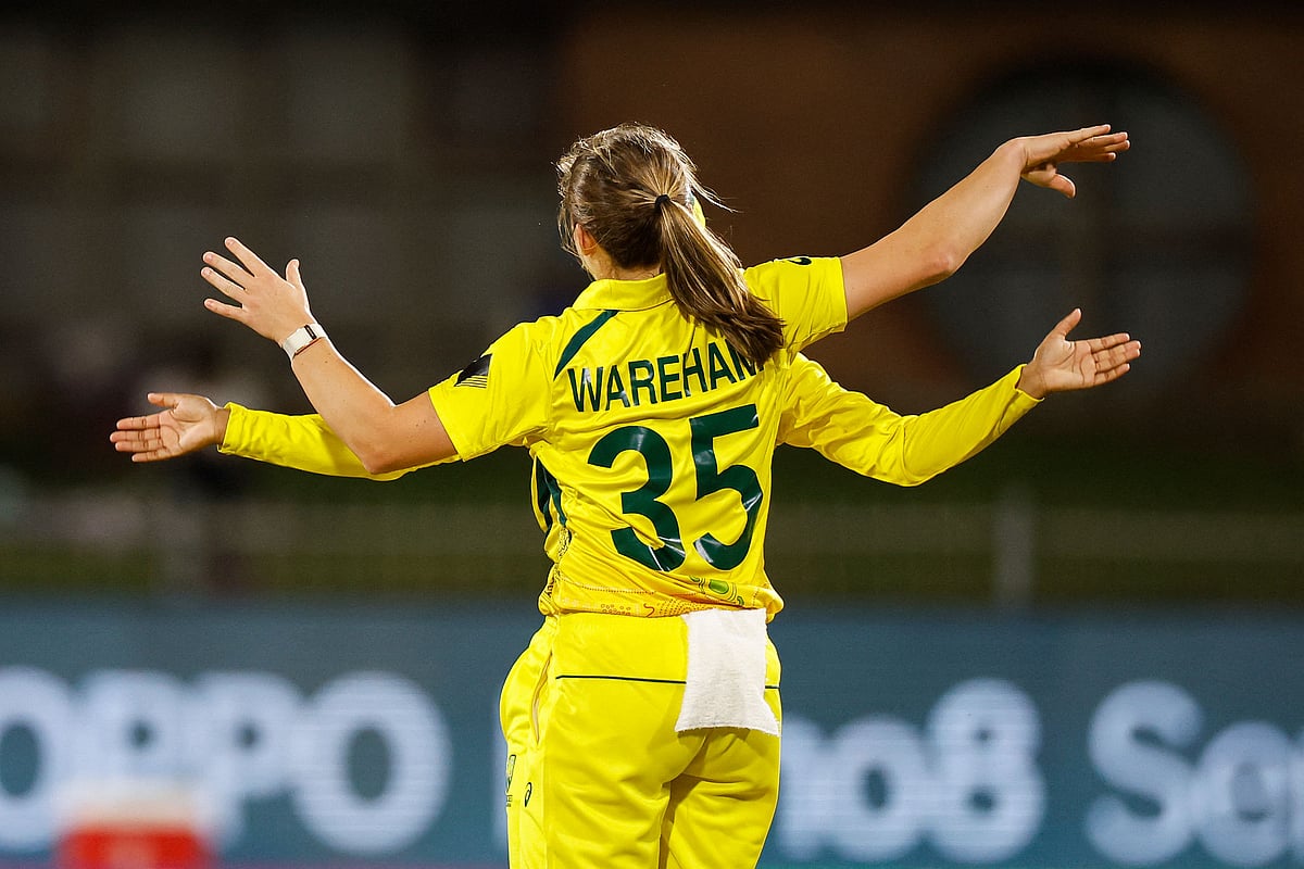 Australia's Georgia Wareham (C) celebrates after the dismissal of Bangladesh's Sobhana Mostary (not seen) during the Group A T20 women's World Cup cricket match between Australia and Bangladesh at St George's Park in Gqeberha on 14 February, 2023
