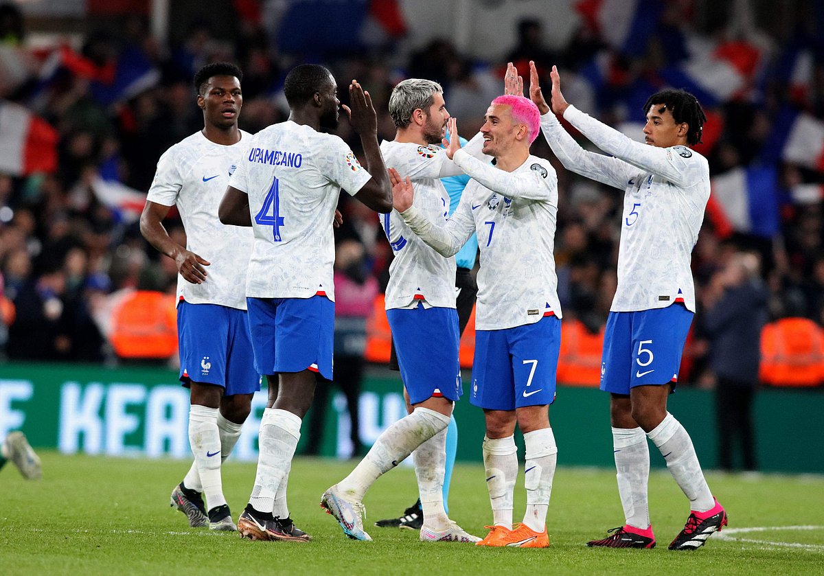 France's players celebrate on the pitch after the UEFA Euro 2024 group B qualification football match between Republic of Ireland and France at Aviva Stadium in Dublin, Ireland on 27 March, 2023. France won the game 1-0