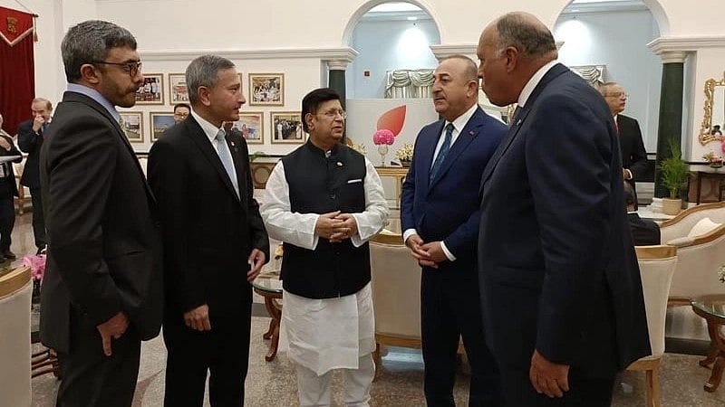 Bangladesh Foreign Minister AK Abdul Momen talks to other guests attended the G20 Foreign Ministers' Meeting in New Delhi, India, on 2 March 2023