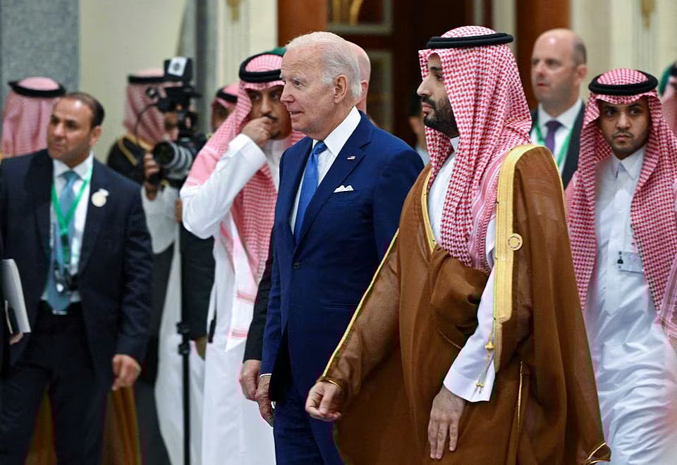 US President Joe Biden and Saudi Crown Prince Mohammed bin Salman arrive for the family photo during the Jeddah Security and Development Summit (GCC+3) at a hotel in Jeddah, Saudi Arabia on 16 July, 2022.