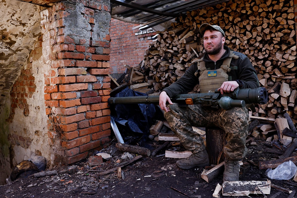 Anti-aircraft unit serviceman of the 10th Mountain Assault Brigade, call sign "Chub", 34, poses for a portrait with a portable anti-aircraft missile system, amid Russia's attack on Ukraine, near Soledar north of Bakhmut, Ukraine March 23, 2023