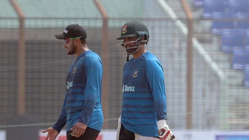 Shakib Al Hasan speaks with Tamim Iqbal during the Bangladesh team's training session at the Zahur Ahmed Chowdhury Stadium in Chattogram on 4 March 2023