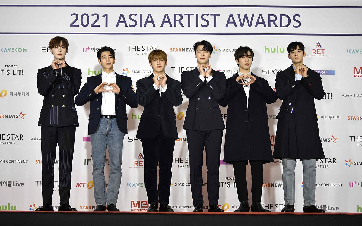 This picture taken on December 2, 2021 shows members of K-pop boy band Astro attending a red carpet event of the Asia Artist Awards in Seoul. K-pop star Moonbin, a member of the boy band Astro, has died at the age of 25, his music label Fantagio announced on April 20, 2023